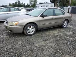Salvage cars for sale from Copart Graham, WA: 2005 Ford Taurus SE