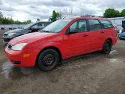 Salvage cars for sale from Copart Ontario Auction, ON: 2005 Ford Focus ZXW
