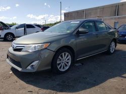 Salvage cars for sale from Copart -no: 2012 Toyota Camry Hybrid