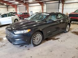 Salvage cars for sale at Lansing, MI auction: 2014 Ford Fusion S Hybrid
