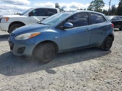 Salvage cars for sale from Copart Graham, WA: 2014 Mazda 2 Sport