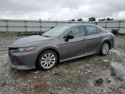 Flood-damaged cars for sale at auction: 2019 Toyota Camry L