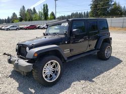 Salvage cars for sale from Copart Graham, WA: 2015 Jeep Wrangler Unlimited Sport