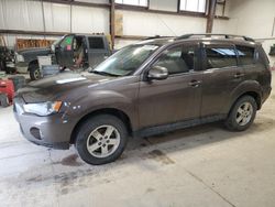 Salvage cars for sale from Copart Nisku, AB: 2010 Mitsubishi Outlander XLS