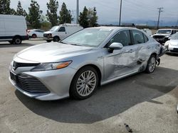 Salvage cars for sale at Rancho Cucamonga, CA auction: 2018 Toyota Camry Hybrid