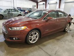 Salvage cars for sale at Avon, MN auction: 2016 Ford Fusion Titanium HEV