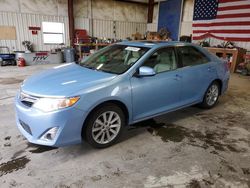 Salvage cars for sale from Copart Helena, MT: 2013 Toyota Camry Hybrid