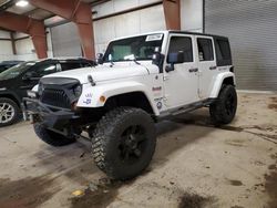 Salvage cars for sale at Lansing, MI auction: 2011 Jeep Wrangler Unlimited Sahara
