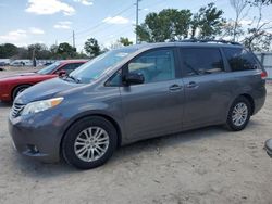 Salvage cars for sale at Riverview, FL auction: 2014 Toyota Sienna XLE