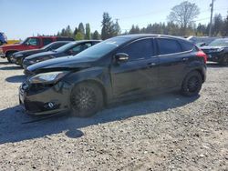 Salvage cars for sale from Copart Graham, WA: 2013 Ford Focus Titanium