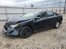 Salvage vehicles for parts for sale at auction: 2014 Toyota Camry L