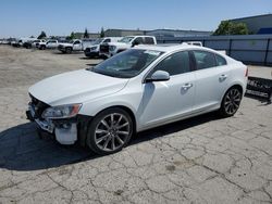 Salvage cars for sale from Copart Bakersfield, CA: 2015 Volvo S60 Premier