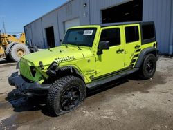 Salvage cars for sale at Jacksonville, FL auction: 2016 Jeep Wrangler Unlimited Sport