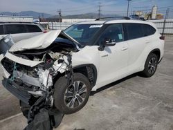 Salvage cars for sale from Copart Sun Valley, CA: 2020 Toyota Highlander Hybrid XLE