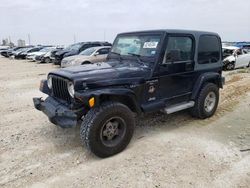 Salvage cars for sale from Copart New Braunfels, TX: 2001 Jeep Wrangler / TJ Sahara