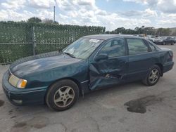 Salvage cars for sale at Orlando, FL auction: 1998 Toyota Avalon XL