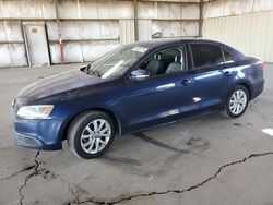 Salvage cars for sale at Phoenix, AZ auction: 2011 Volkswagen Jetta SE