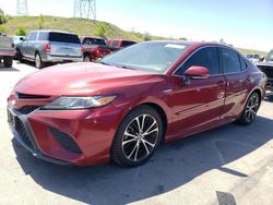 Salvage cars for sale at auction: 2018 Toyota Camry Hybrid