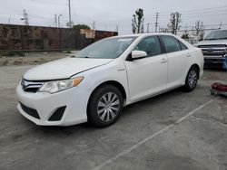 Salvage cars for sale at Wilmington, CA auction: 2013 Toyota Camry Hybrid