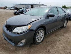 Salvage cars for sale from Copart Elgin, IL: 2014 Toyota Camry Hybrid