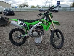Salvage motorcycles for sale at Central Square, NY auction: 2021 Kawasaki KX450 F