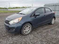 Salvage cars for sale from Copart Ottawa, ON: 2013 KIA Rio LX
