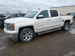 Salvage trucks for sale at Rocky View County, AB auction: 2014 Chevrolet Silverado K1500 LTZ