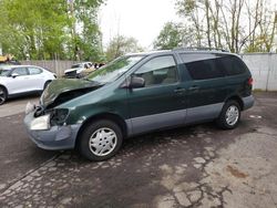 Salvage cars for sale from Copart Portland, OR: 2001 Toyota Sienna LE