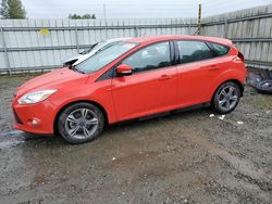 Salvage cars for sale from Copart Arlington, WA: 2014 Ford Focus SE