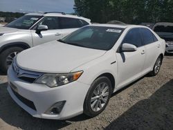 Salvage cars for sale from Copart Arlington, WA: 2012 Toyota Camry Hybrid