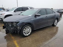 Carros salvage a la venta en subasta: 2012 Toyota Camry Hybrid