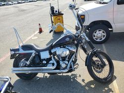 Salvage Motorcycles for sale at auction: 2004 Harley-Davidson Fxdwg