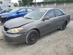 Salvage cars for sale from Copart Opa Locka, FL: 2003 Toyota Camry LE