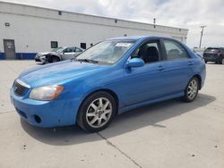 Salvage cars for sale from Copart Farr West, UT: 2005 KIA Spectra LX