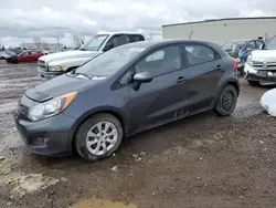 Salvage cars for sale from Copart Rocky View County, AB: 2013 KIA Rio LX
