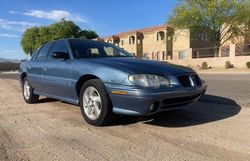 Salvage cars for sale from Copart Phoenix, AZ: 1998 Pontiac Grand AM SE
