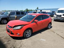 Salvage cars for sale at Woodhaven, MI auction: 2012 Ford Focus SEL