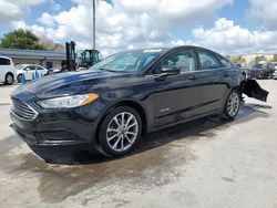 Salvage cars for sale at Orlando, FL auction: 2017 Ford Fusion SE Hybrid