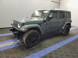 Salvage cars for sale at Orlando, FL auction: 2024 Jeep Wrangler Sahara 4XE