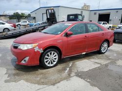 Salvage vehicles for parts for sale at auction: 2013 Toyota Camry Hybrid