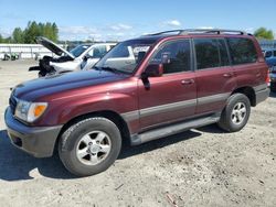 Salvage cars for sale at Arlington, WA auction: 1999 Toyota Land Cruiser