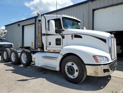 Salvage trucks for sale at Lansing, MI auction: 2009 Kenworth Construction T660