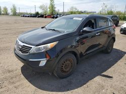 Salvage cars for sale from Copart Montreal Est, QC: 2012 KIA Sportage EX