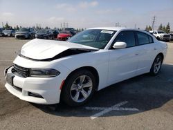 Salvage cars for sale from Copart Rancho Cucamonga, CA: 2015 Dodge Charger SXT