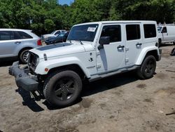 Salvage cars for sale at Austell, GA auction: 2012 Jeep Wrangler Unlimited Sahara