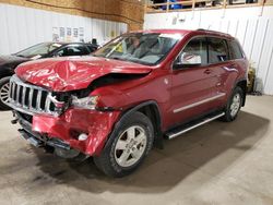 Salvage cars for sale from Copart Anchorage, AK: 2011 Jeep Grand Cherokee Laredo