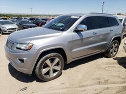Salvage SUVs for sale at auction: 2014 Jeep Grand Cherokee Overland