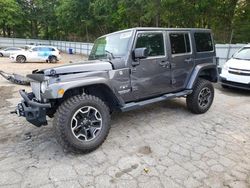 Salvage cars for sale at Austell, GA auction: 2016 Jeep Wrangler Unlimited Sahara