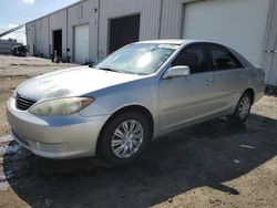 Salvage cars for sale from Copart Jacksonville, FL: 2005 Toyota Camry LE