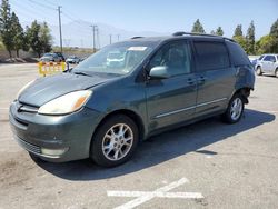 Toyota Sienna xle salvage cars for sale: 2005 Toyota Sienna XLE